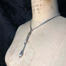 Silvery Draped Serpent