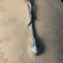 Silvery Draped Serpent