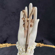 Serpentine Bow Necklace