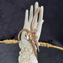 Serpentine Bow Necklace